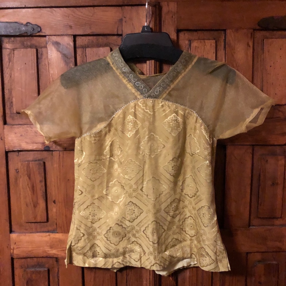 Fancy top handmade in China. (Tag is in Chinese.)